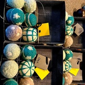 Beautifully felted wall eggs with silver loops to hang